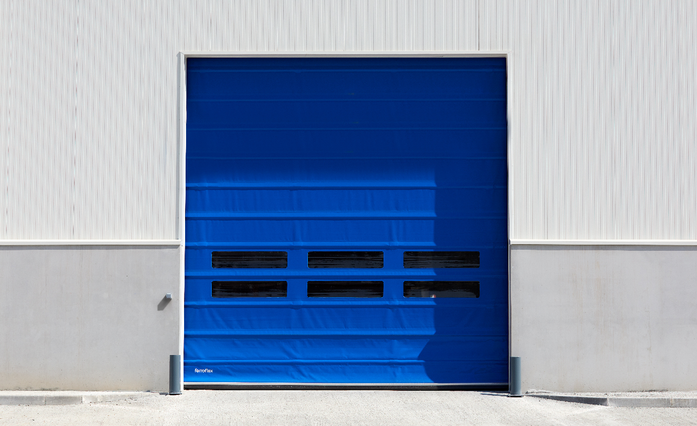 stackable high-speed door with blue tarpaulin and 6 peepholes
